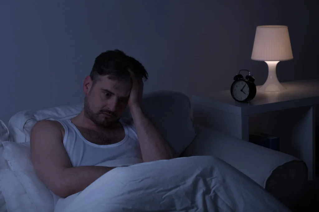 Stressed man not getting sleep at night in Salt Lake City, UT | Santosh Yoga Institute